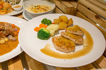  delicious pork steak on white plate