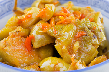close-up of olive pickled in bowl.