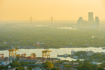 Bangkok, Thailand - 21 June 2018, City view showing dust, air pollution of Thailand at 2.5 microns or less (PM 2.5), higher than the standard level in the air around Bangkok. In the evening