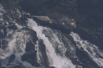 Fototapeta premium Closeup view waterfall scene in mountains, national park of Dombay, Caucasus