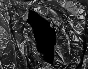 Black drapery plastic bag texture and background, isolated and clipping