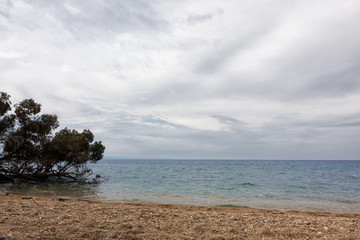 Gorgeous scenery by the sea under a cloudy sky in Sithonia, Chalkidiki, Greece