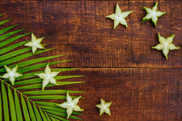 Star fruit, starfruit or star apple , Averrhoa carambola slice background