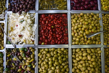 Close-up of pickles and coloured olives. Levinsky market, Tel Aviv