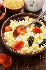Millet porridge with dried fruits