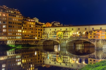 Fototapeta na wymiar Ponte Vecchio in Florence, Italy, on a summer night.