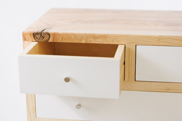 Handmade wooden table with drawers on white background