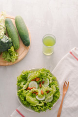 vegetable green salad bowl on kitchen table, balanced diet