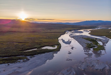 Top view landscape with a river and clouds, Yamal, Polar Urals, Russia