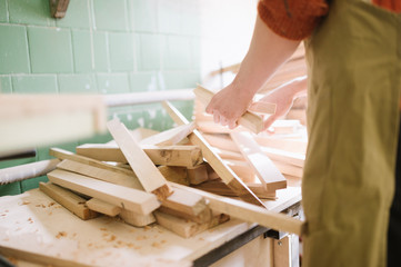 The master works in the carpentry workshop