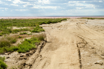 Salt lake. Elton. Footprints in the sand.