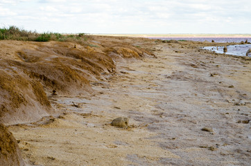 Salt lake. Elton. Footprints in the sand.