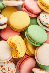 Colorful french macarons background. Pastel colors. Overhead