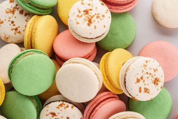 Colorful french macarons background. Pastel colors. Overhead