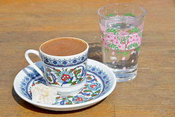 cup of Turkish coffee on wooden table