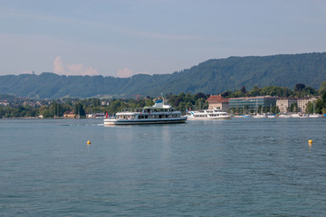 Fototapeta na wymiar View on lake Zurich and mountains scenes, Zurich, Switzerland, Europe