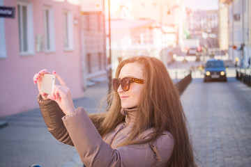 young beauty woman make selfie for self smartphone