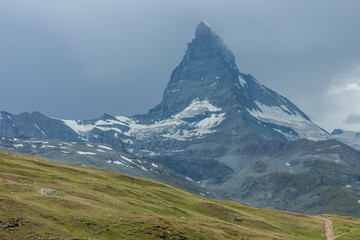 summer landscape with Matterhorn mount and glaciers Swizerland Alps