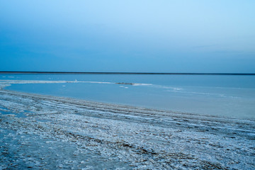 Obraz premium Salt lake. Elton. Footprints in the sand.