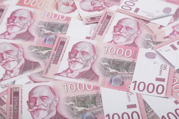 Money and finances concept. One thousand Serbian dinar bill national currency banknotes.