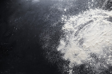 Flour on the table background