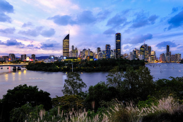 Brisbane city skyline and Brisbane River at dusk in Queensland, Australia