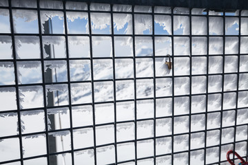 Obraz premium Ice on metal screen background in the nature of Jungfraujoch mountain, Switzerland