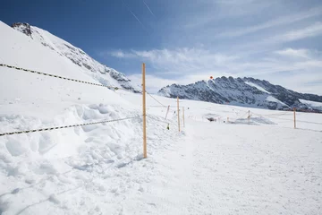 Fotobehang Jungfraujoch is a famous travel mountain of the Alps, Switzerland © lirtlon