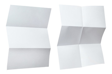 Folded sheets of white paper, isolated on white background