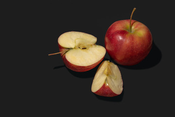 apples on black background