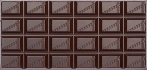 dark organic natural chocolate bar close-up top view