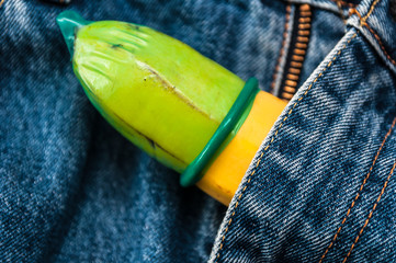 green condom in jeans 