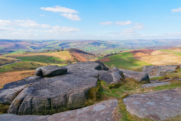 Fototapeta na wymiar From the gritstone slabs on top of Higger Tor out across the Derbyshire Peak District.