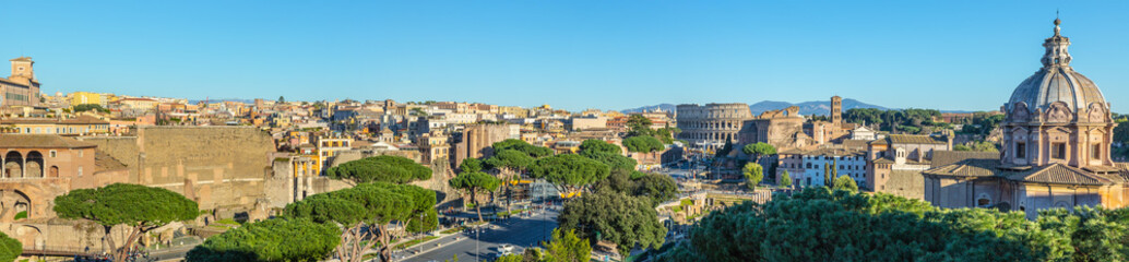 Fototapeta na wymiar Scenic panorama of Rome with Colosseum and Roman Forum, Italy.