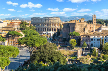 Fototapeta na wymiar Scenic shot of Rome with Colosseum and Roman Forum, Italy.
