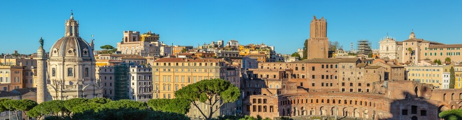 Fototapeta na wymiar Panoramic view at Trajan's Column and Santa Maria di Loreto church, Rome, Italy