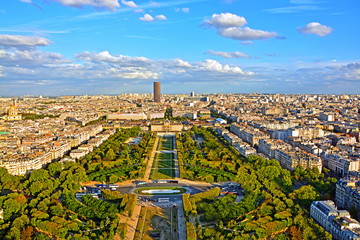 Aerial panoramic view of Paris and Champ de Mars from Eiffel Tower in Paris at sunset, France.