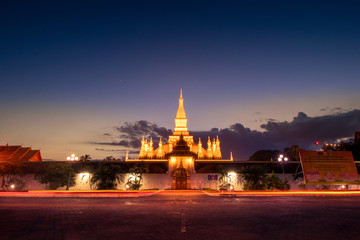 Vientiane is the capital of Laos. Phra That Luang Stupa It is very beautiful gold at night. - Image