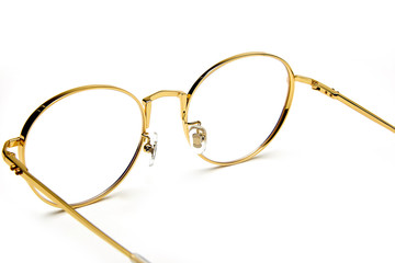 Golden border glasses on white background