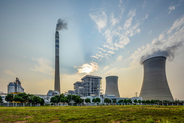At dusk, the thermal power plants , tops of cooling towers of atomic power plant