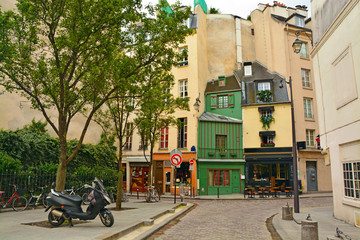 Latin Quarter of Paris. Narrow cobbled street among old traditional parisian houses in Paris, France