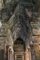 Fototapeta na wymiar stone frame ruins attraction ancient temple in complex Angkor Wat in Siem Reap, Cambodia