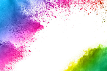 Multi color powder explosion  on white background.
