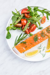 Serving cold smoked salmon fish, restaurant dish on plate
