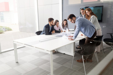 Business colleagues in conference room working together