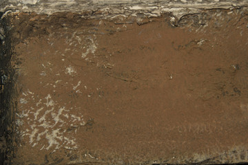 Old brown wall with textured pattern