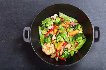 stir fried vegetables in a wok, top view