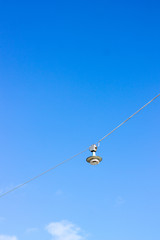 Old vintage street lamp hanging above the street in the Helsinki