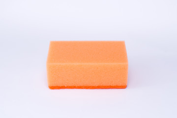 orange washcloth for washing dishes on a white background