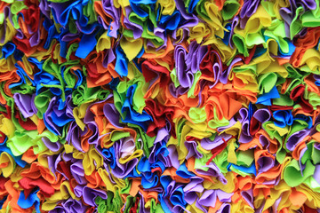 Fototapeta na wymiar Close up of colorful material showing interesting texture